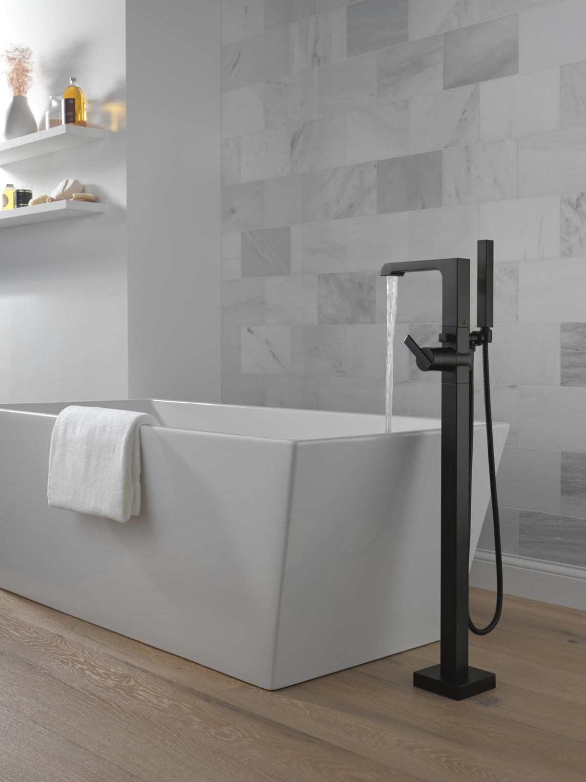 T4767-BLFL Ara® Single Handle Floor Mount Tub Filler Trim with Handshower Matte Black